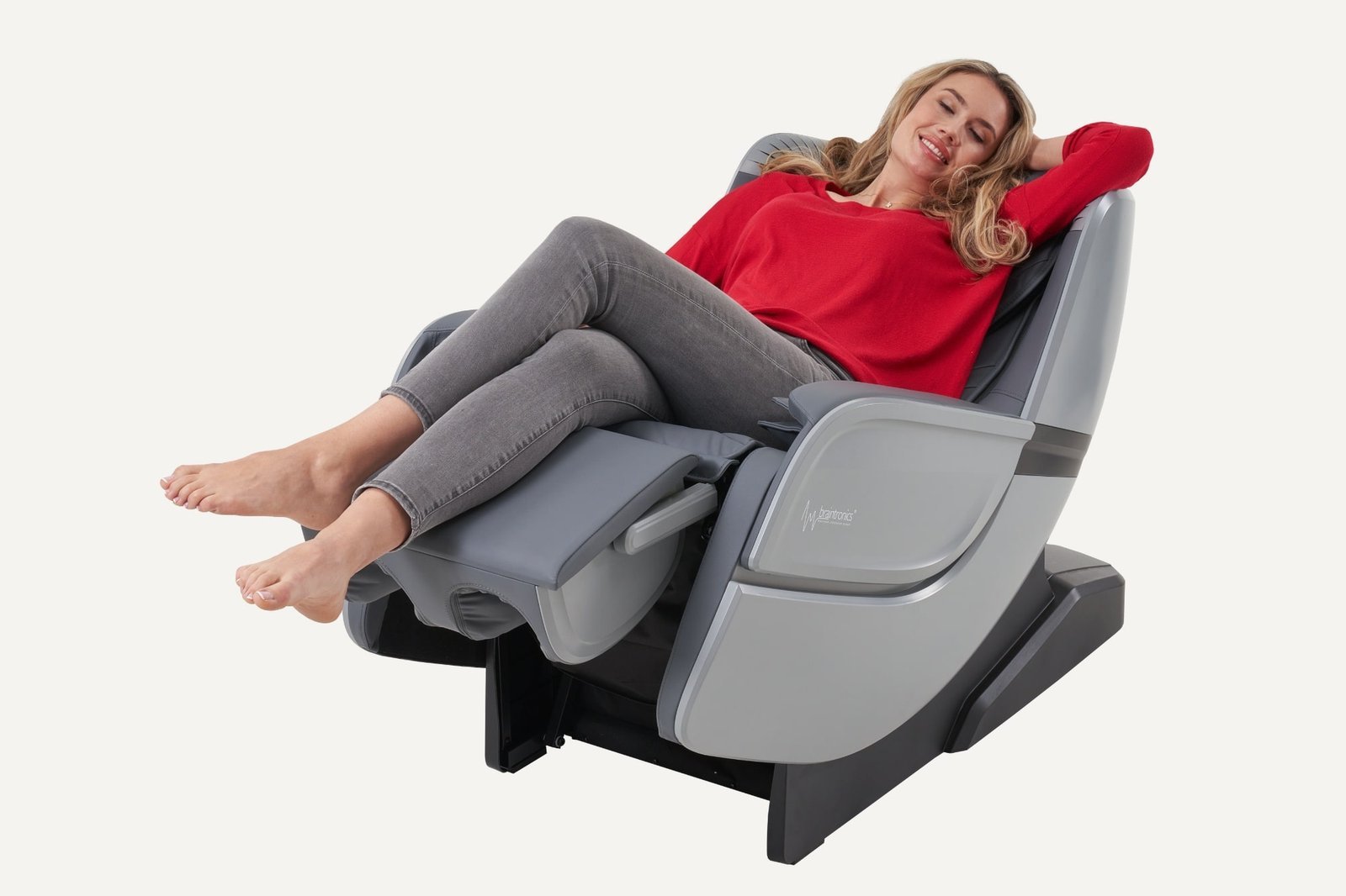 vrouw in rode blouse liggend in massagestoel Casada Ecosonic - Zilver