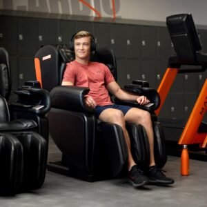 person in basic fit massage chair