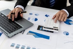 man who calculates what it costs to lease or buy massage chair