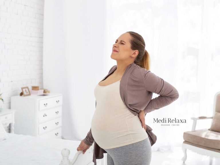 mujer con dolor de espalda durante el embarazo