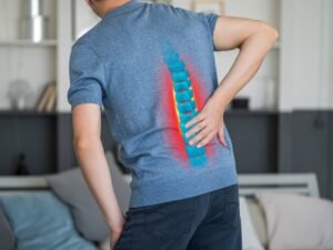 person with back pain middle back